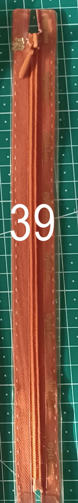 Dragkedja artikel 39, mörk orange